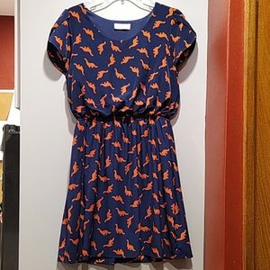 Short sleeved dress with dinosaur print